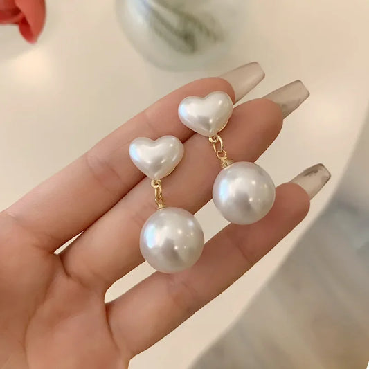 Heart Shaped Pearl Clip On Earrings